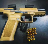 Arma apreendida com o homem (Foto: Divulgação/PC)