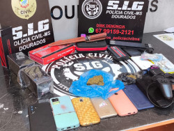 Adolescente e adulto são detidos por furtos em lojas de celulares em Dourados