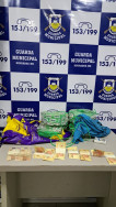 Rolos de fios e dinheiro apreendido com o indivíduo (Foto: Divulgação/GMD)