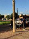 Autor sendo levado para dentro da viatura (Foto: Divulgação/PC)