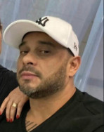 Suspeito de envolvimento no assassinato de jovem em garagem escondia munições e R$ 10 mil em espécie