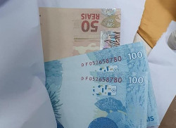 Mulher é presa nos Correios de Dourados retirando dinheiro falso