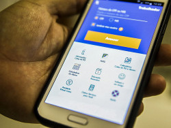 O site informa apenas a data da liberação e se o crédito será feito de forma automática (Imagem: Agência Brasil)