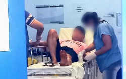 Homem é atacado por cachorros pitbull ao tentar pular telhado de casa