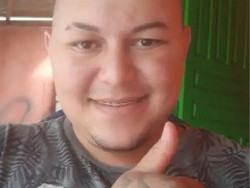 Homem morto durante confronto (Foto: Campo Grande News)