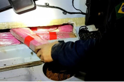 Juíza decreta prisão de douradense flagrada com droga e fuzil