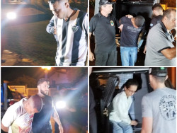 Acusados durante chegada em Dourados (Foto: Adilson Domingos)